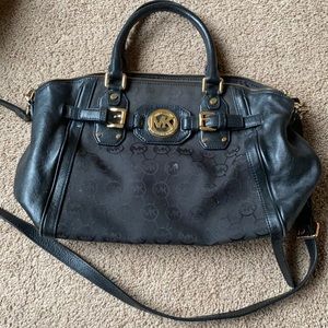 Black and gold MK bag